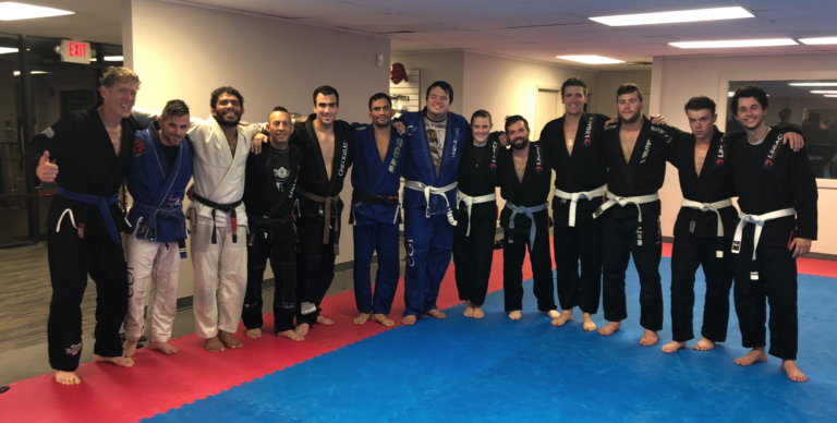 Team members with Lucas Leite after a seminar